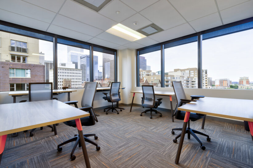 Large corner office with beautiful downtown views and massive windows with natural light. Height adjustable standing desks and comfortable ergonomic chairs