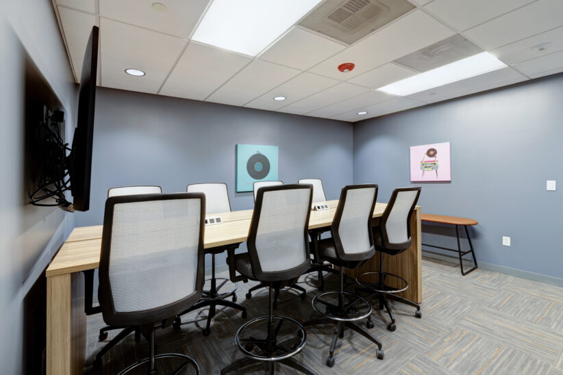 Nice modern meeting space for 8 with lots of room, large TV, and large whiteboard